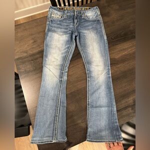 Rock Revival Light Blue Boot Cut Mid-Rise Jeans
Size 31